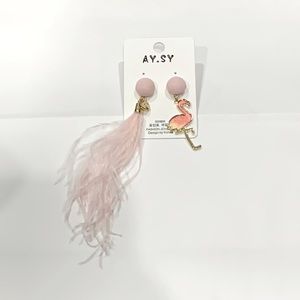 Asymmetric pink earrings one side with fur and one side with swan